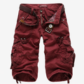 Maroon cargo shorts with multiple pockets and a belt on a white background