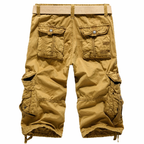 Tan cargo shorts with multiple pockets on a white background